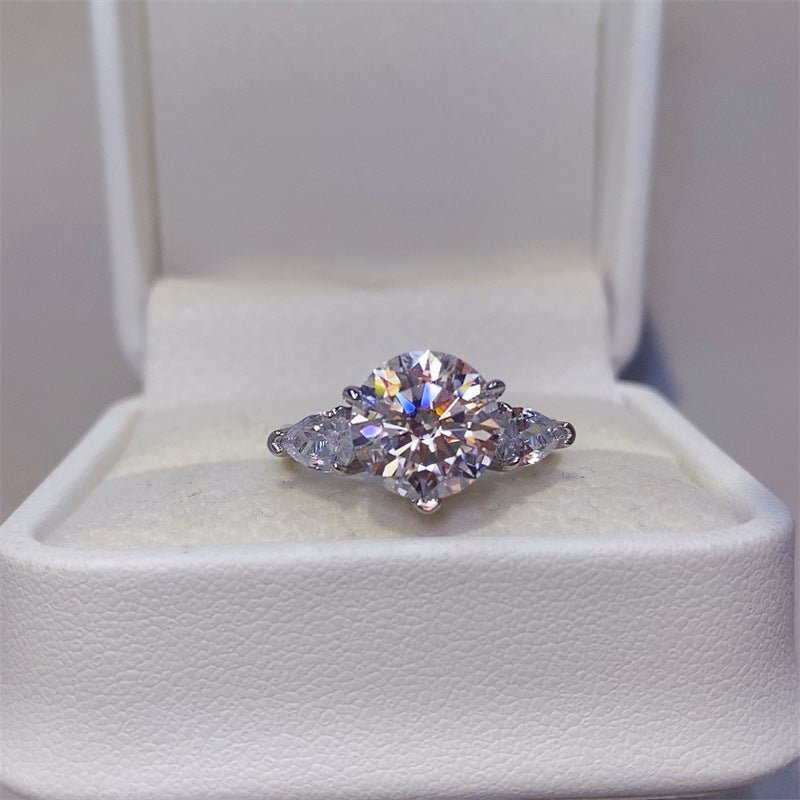 3 Carat Moissanite Ring for Women, Three-Stone Engagement Ring with Round Center and Pear Side Stones – view 1